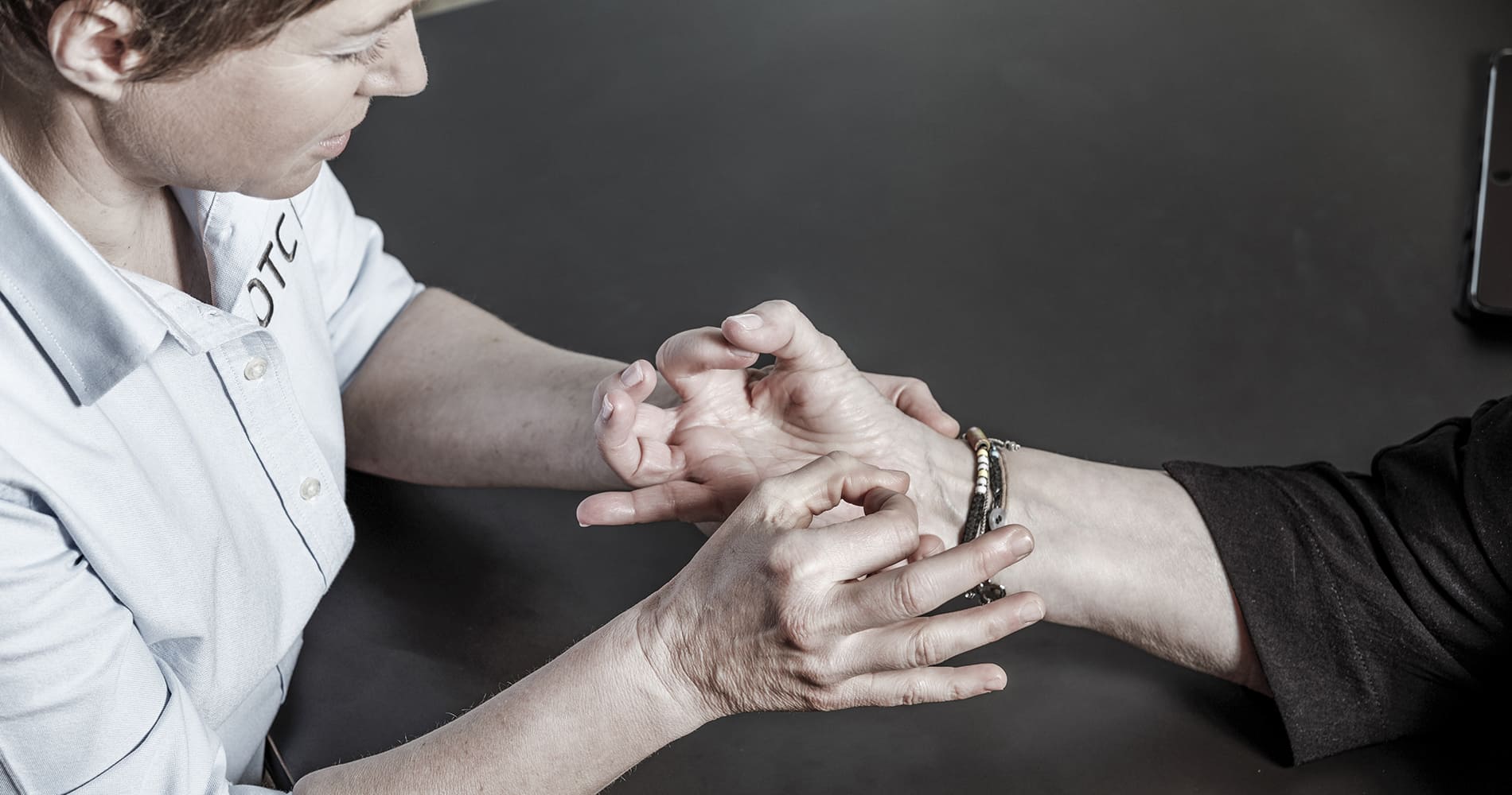Doctor checks Patient Arm - Image