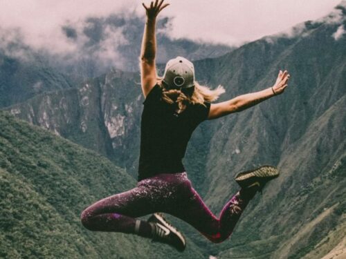 Person jumps in front of ravine - Image
