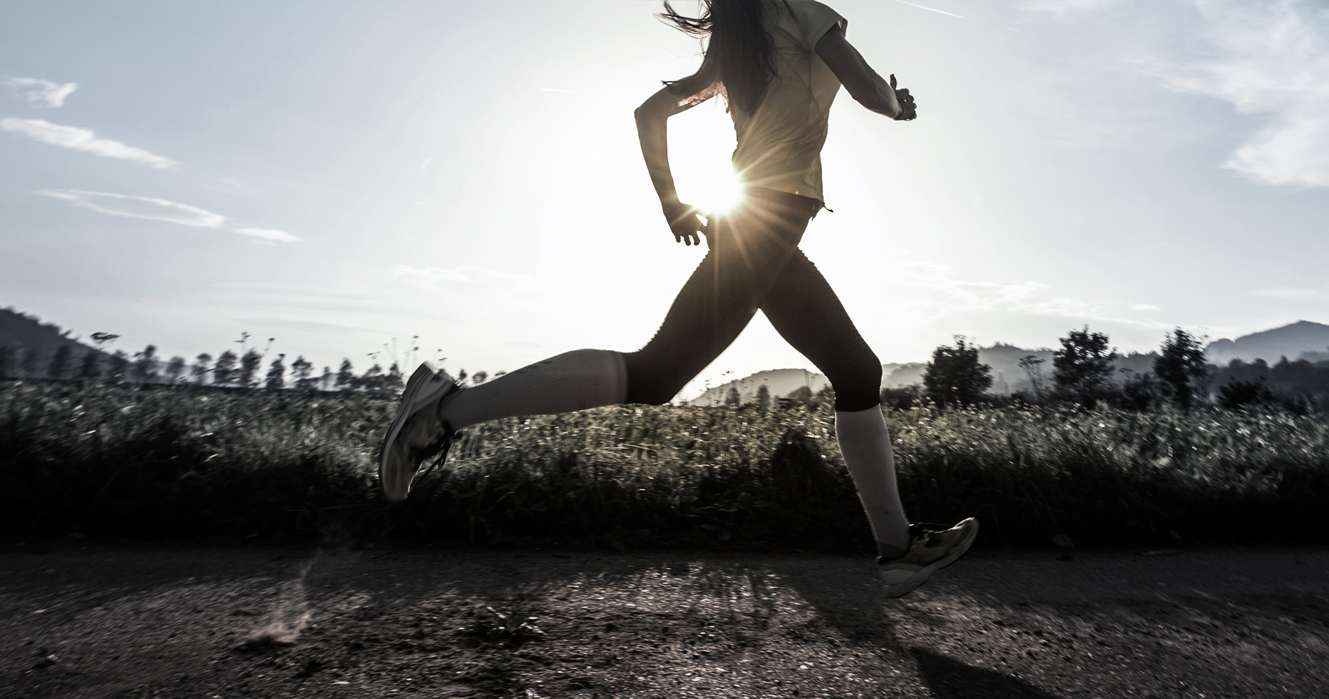 Person running in field - Image